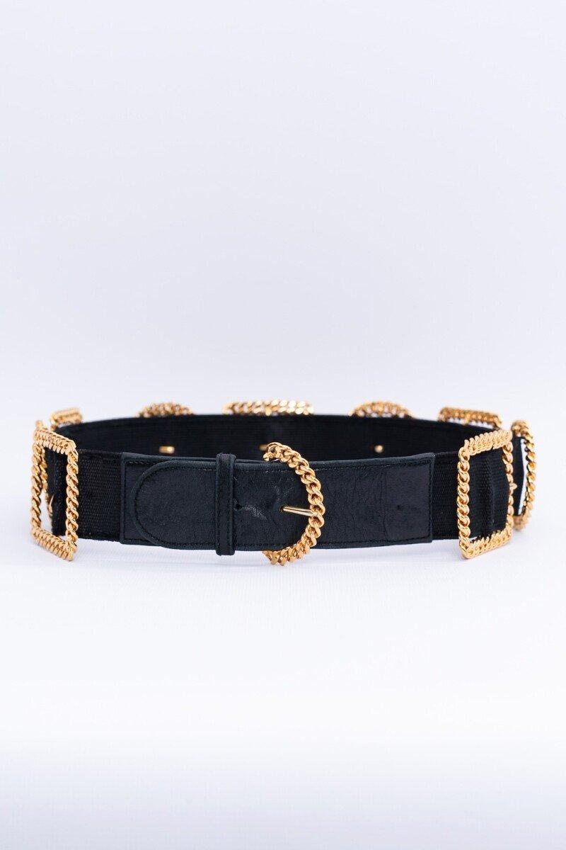Chanel (Made in France) Black leather and elastic belt embellished with gilded metal buckles. Size 70/28.

Additional information: 

Dimensions: 
Length: 73 cm to 75 cm (28.74