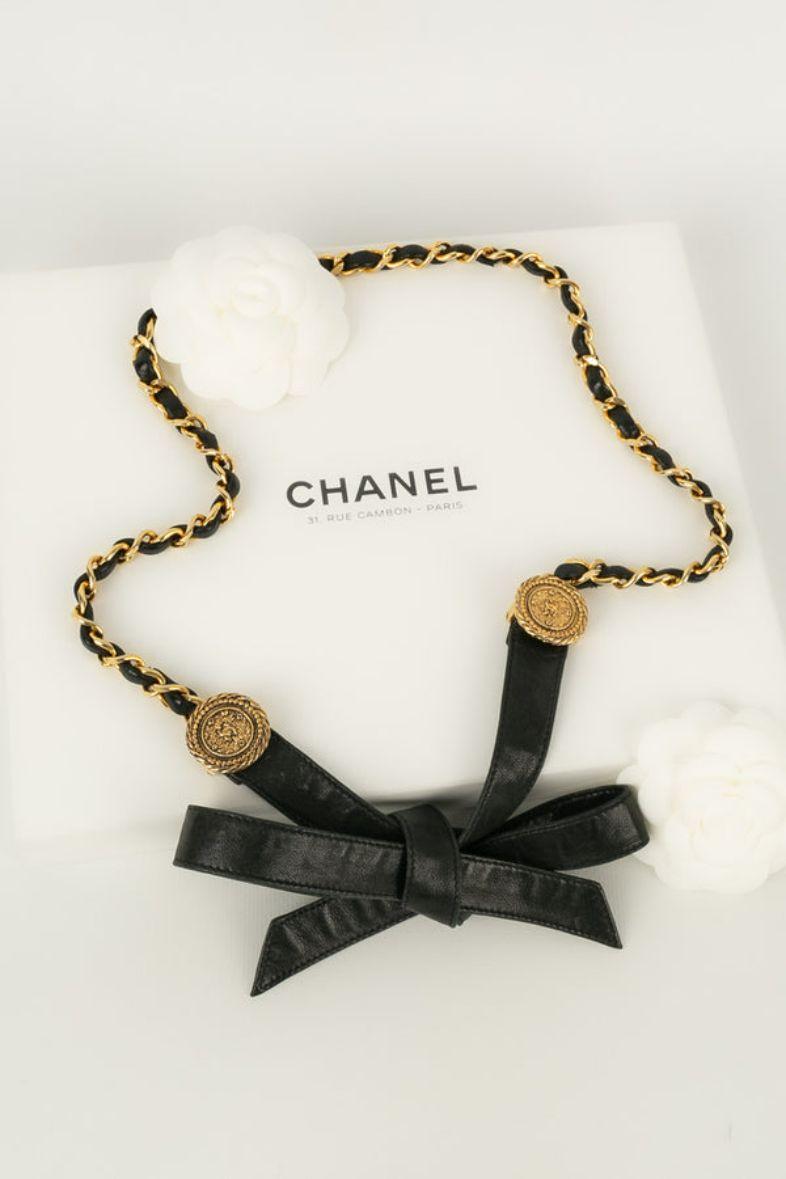 Chanel - (Made in France) Black leather and gold metal belt. Size 75.

Additional information: 
Dimensions: Total length: 136 cm
Condition: Very good condition
Seller Ref number: CCB20