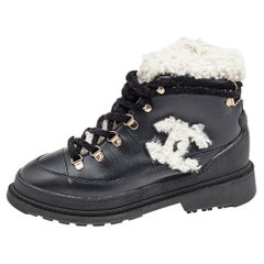 Chanel Schwarze Leder- und Shearling-Schnürstiefeletten Größe 36,5