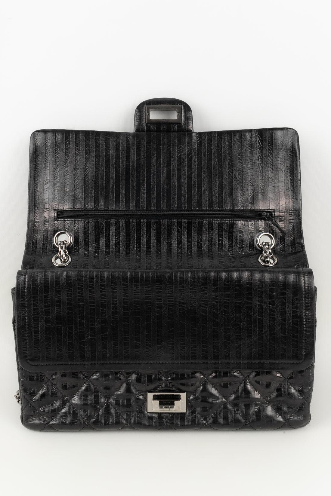 Sac en cuir noir avec éléments en métal argenté de Chanel, 2008/2009 en vente 7