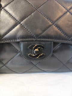 Chanel black leather black and white chain timeless shoulder bag