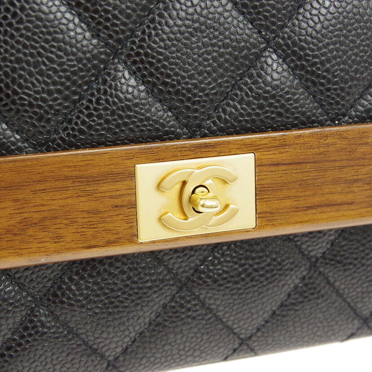 Chanel Black Leather Brown Wood Gold Evening Shoulder Single Flap Bag

Caviar leather
Wood
Leather lining
Date code present
Made in France
Shoulder strap drop 19