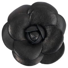CHANEL black leather CAMELLIA Brooch