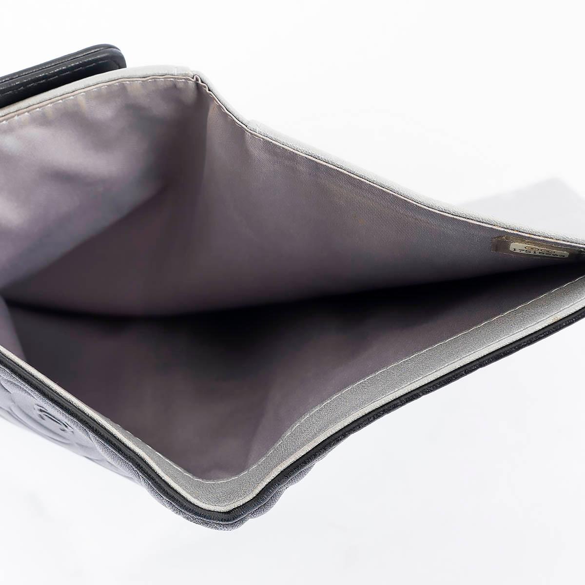 CHANEL black leather CAMELLIA EMBOSSED Large Wallet For Sale 1