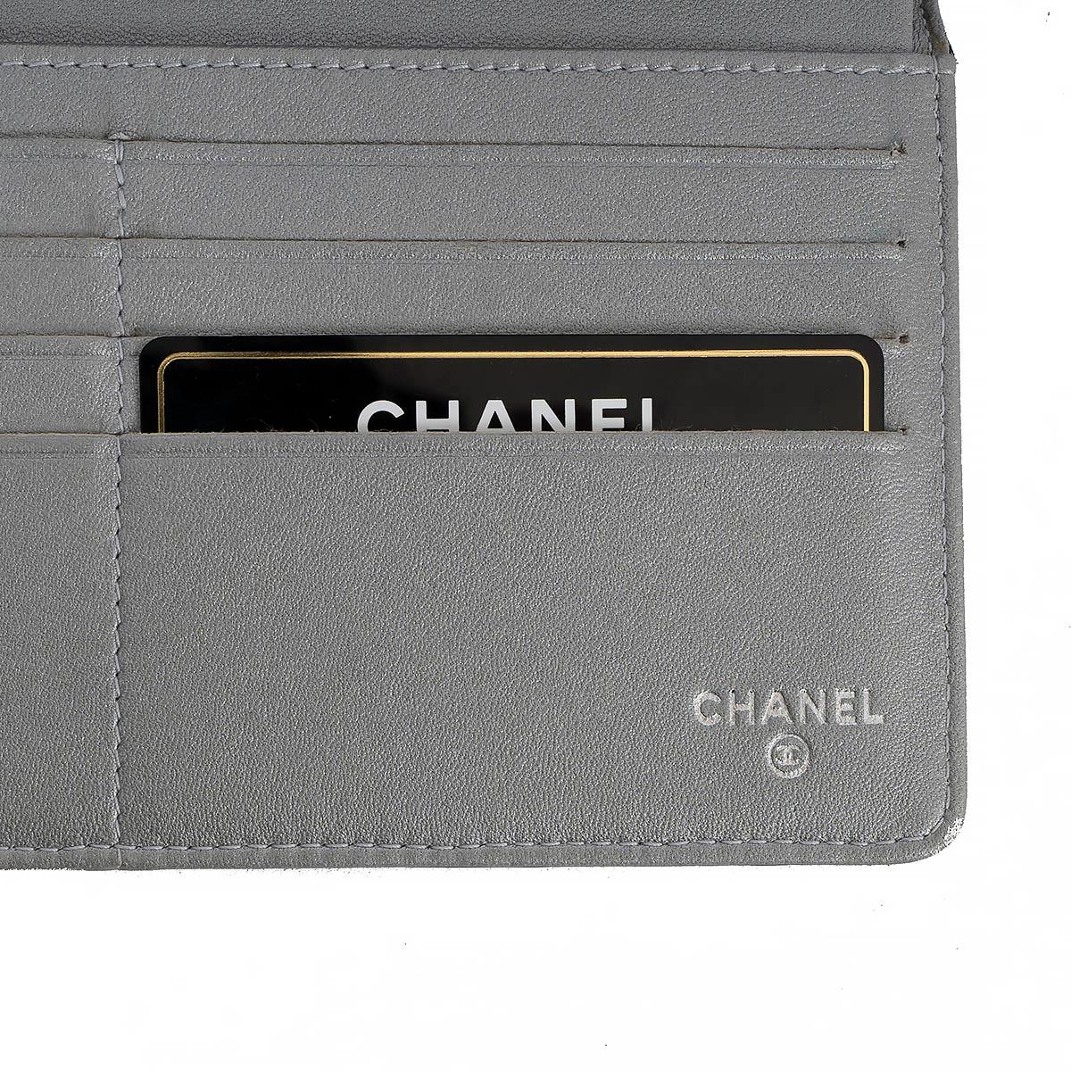CHANEL black leather CAMELLIA EMBOSSED Large Wallet For Sale 2