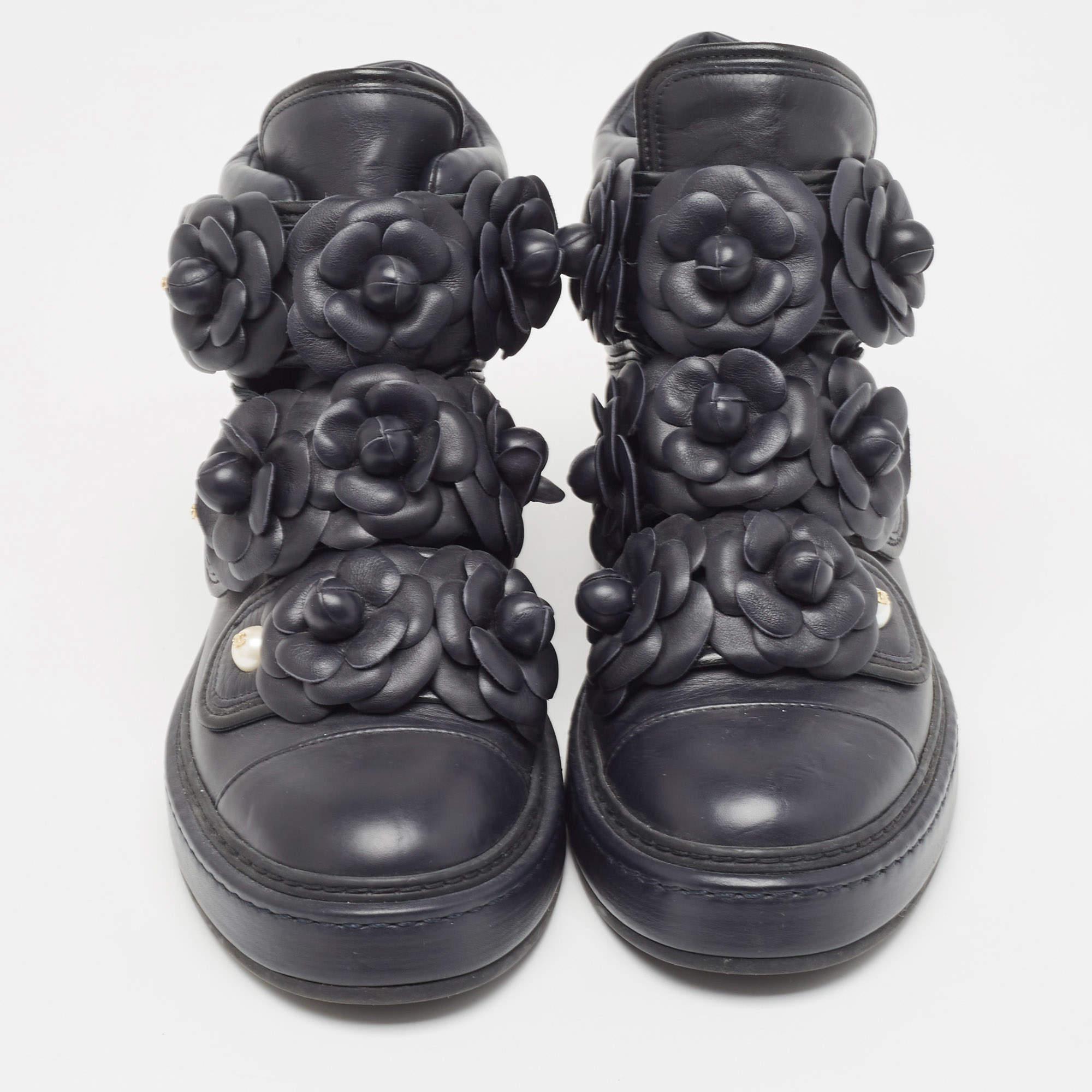 From their Spring 2016 collection, these Chanel sneakers are jaw-droppingly gorgeous. They've been crafted from leather, styled with button closure and decorated with Camellia flowers on the front. The Camellia was a favourite of 