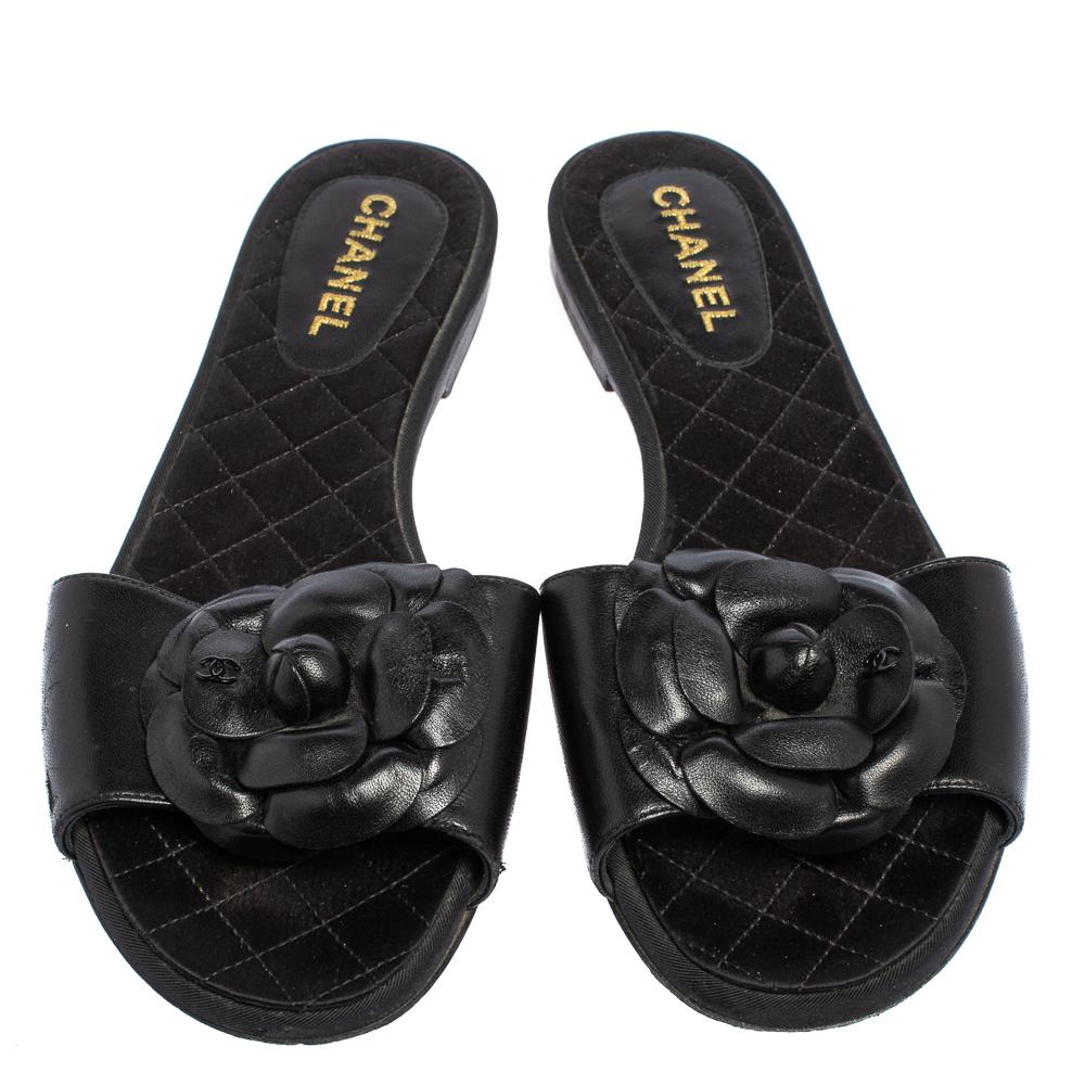 Wear these slides on days when you cannot choose between fashion and comfort for they bring both. They are from Chanel, designed with fabric insoles and front leather straps embellished with the brand's signature Camellia flower.

Includes: Original