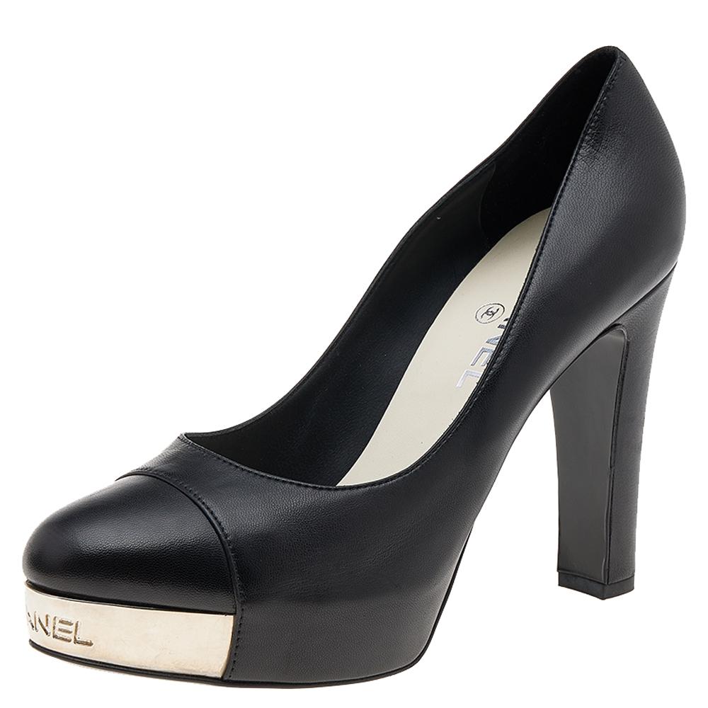 Super-comfortable and loaded with style, this pair of pumps by Chanel will effortlessly complement your workwear. The shoes have been crafted from black leather and styled with sturdy heels and brand-detailed platforms.

