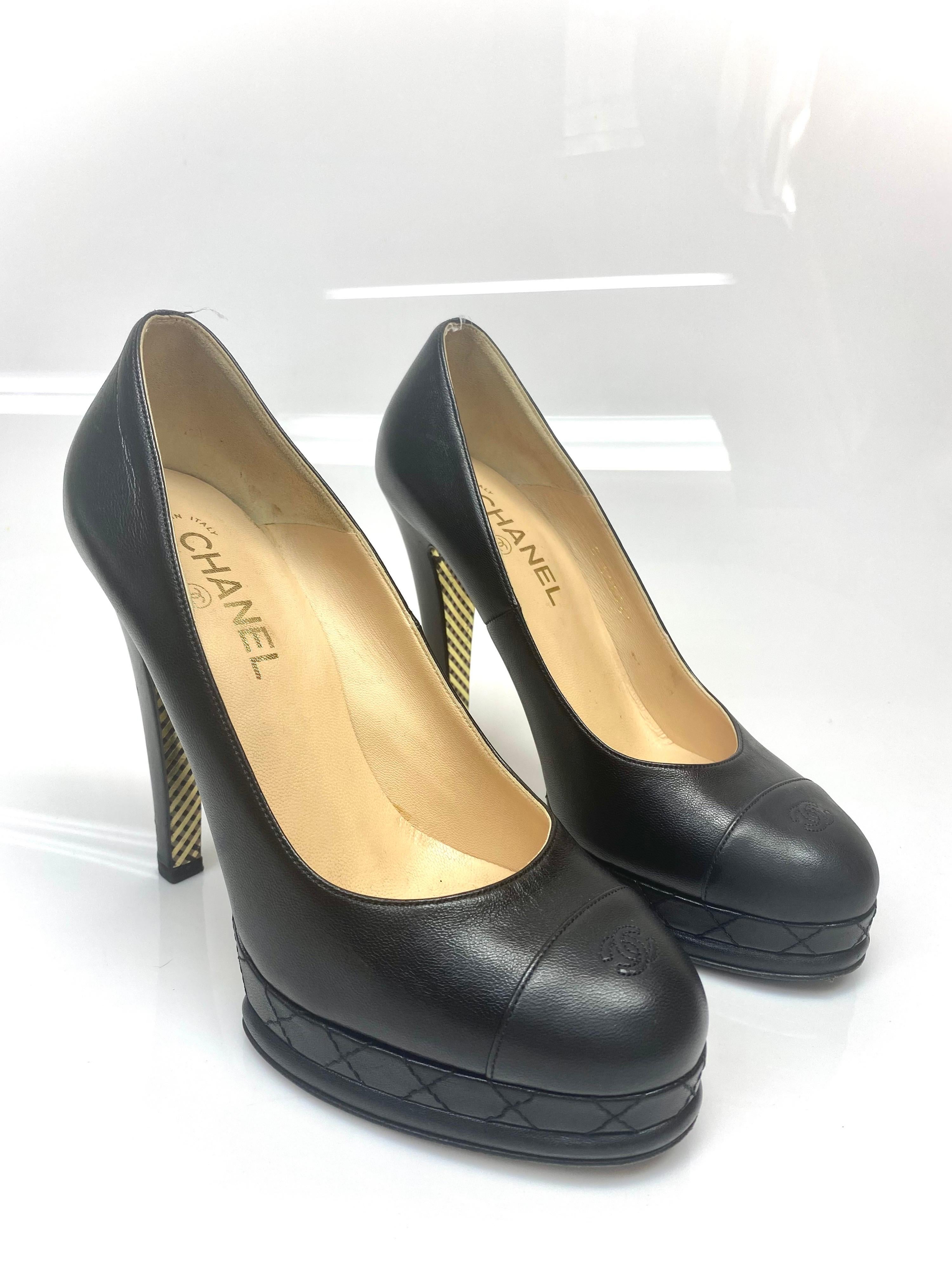 Chanel Black Leather Cap Toe Platform - 40 Take each step with style in these beautifully crafted platforms from Chanel. Crafted from leather, they carry a classic design of glossy cap toes and the signature CC on the counters. The insoles are