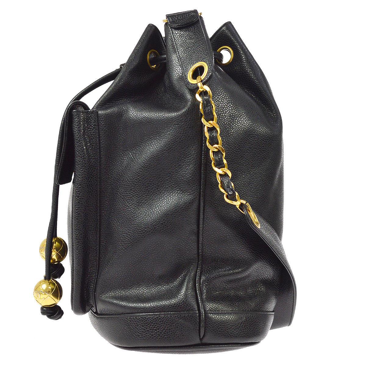 Chanel Black Leather Caviar Gold Charm Logo Drawstring Bucket Shoulder Bag In Good Condition In Chicago, IL