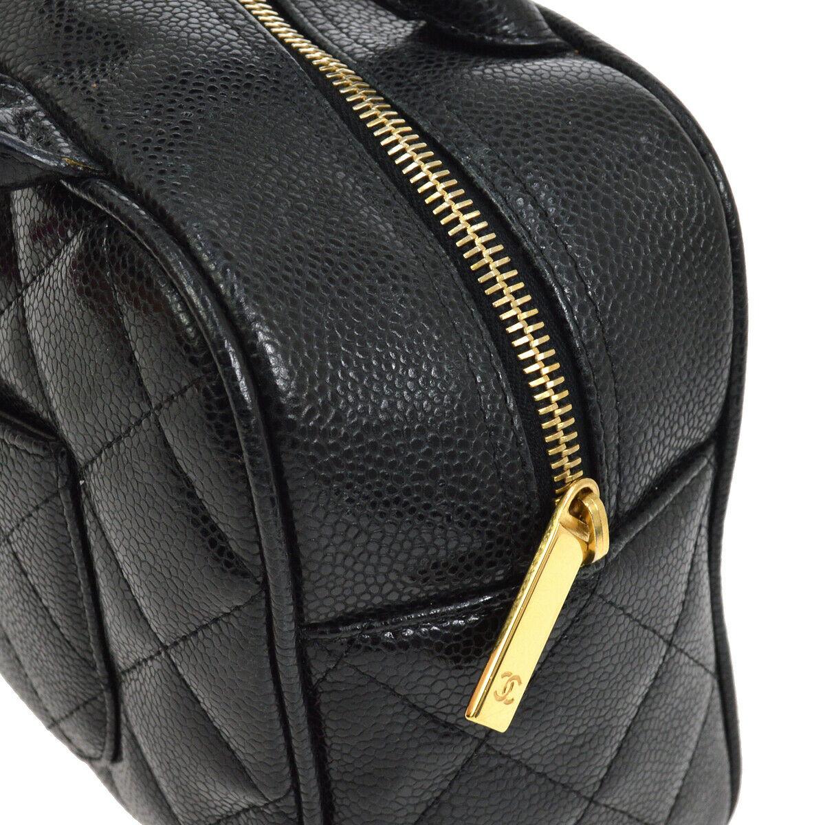 Chanel Black Leather Caviar Small Top Handle Satchel Bowling Tote Bag

Leather
Gold tone hardware
Zipper closure
Made in Italy
Woven lining
Handle drop 4