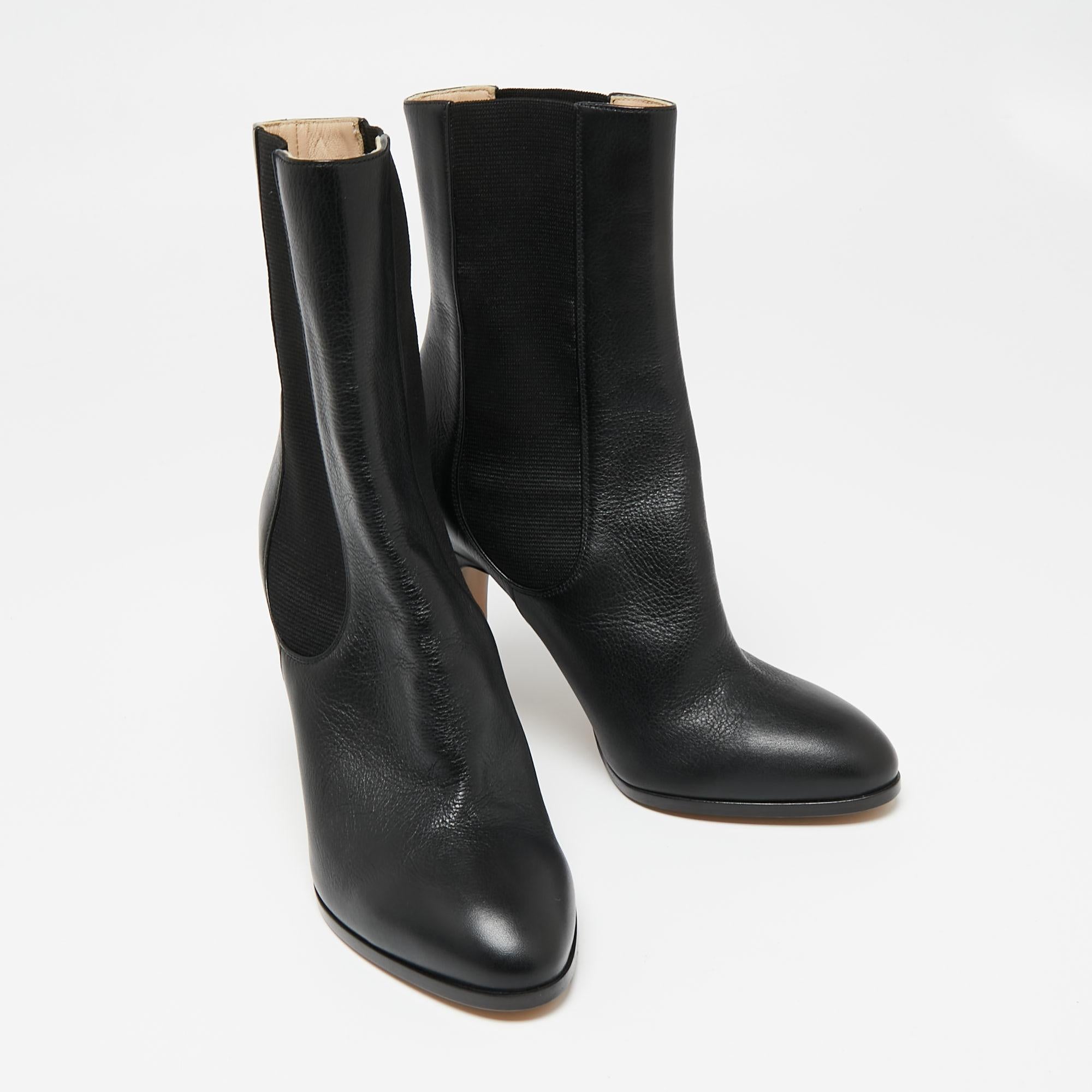 Chanel Black Leather CC Ankle Length Boots Size 38 In New Condition In Dubai, Al Qouz 2