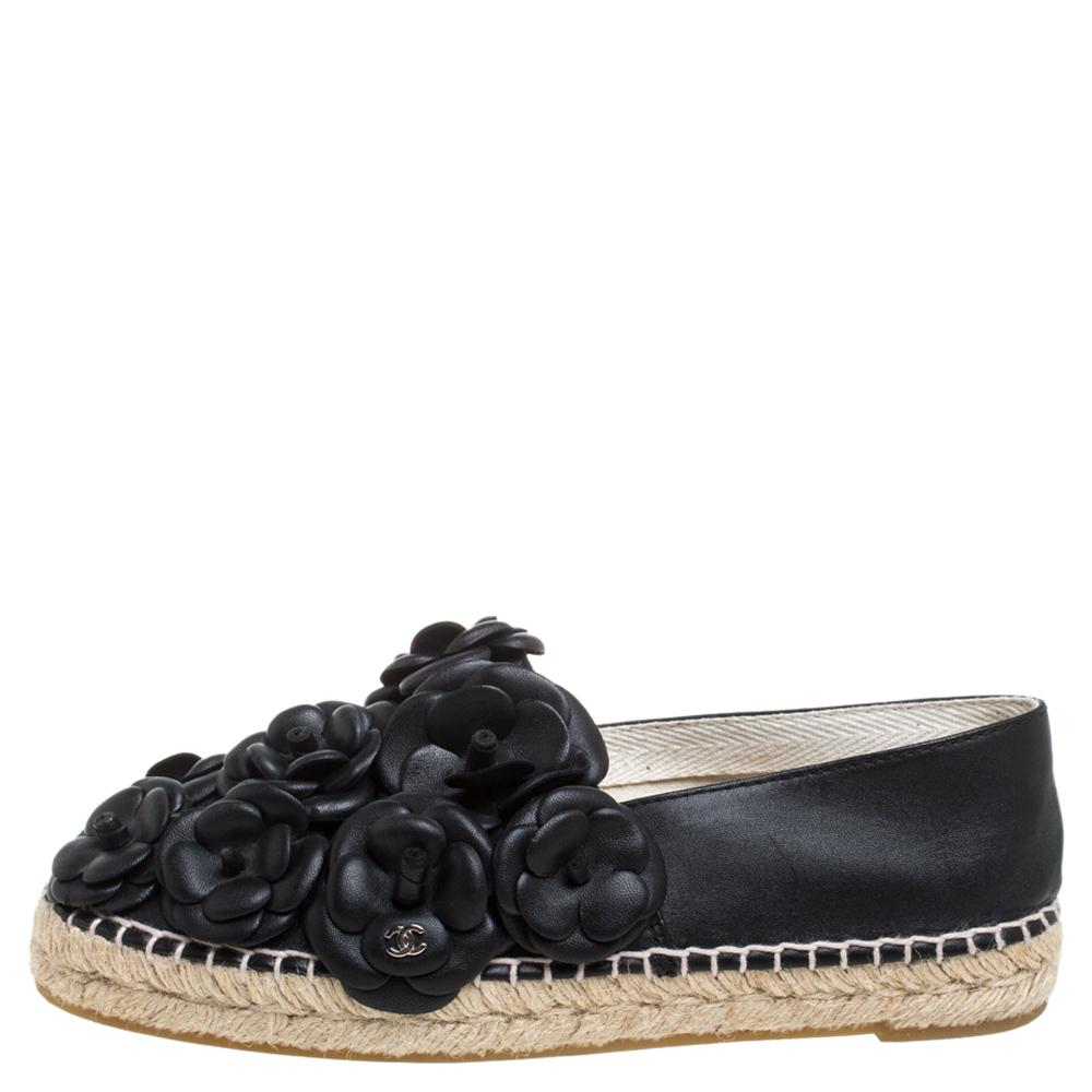 Espadrilles are not just stylish, but also comfortable and easy to wear. This lovely pair from Chanel will accompany a casual outfit with perfection. They are made of quality leather, carry a black hue, and are detailed with signature Camellia
