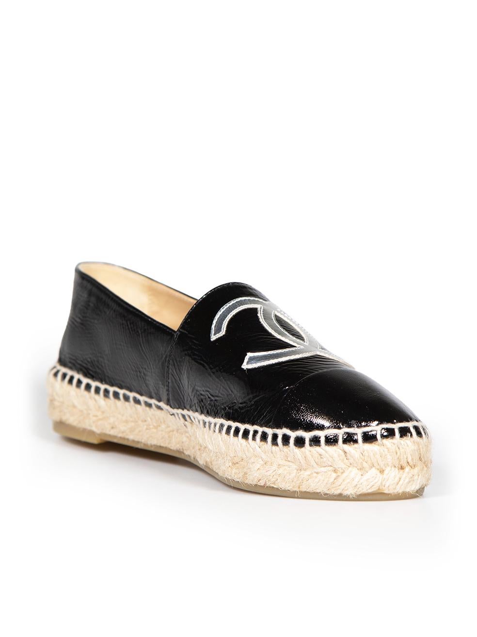 CONDITION is Very good. Hardly any visible wear to espadrilles is evident on this used Chanel designer resale item.
 
 
 
 Details
 
 
 Black
 
 Leather
 
 Espadrilles
 
 Silver interlocking CC logo toe
 
 Slip on
 
 Round toe
 
 
 
 
 
 Made in