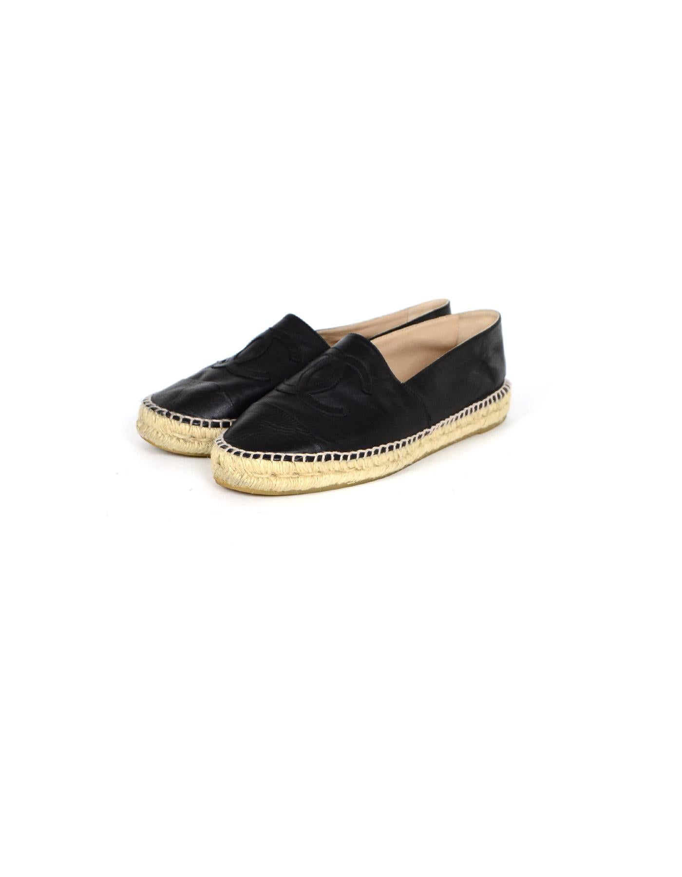 Chanel Black Leather CC Espadrilles sz 42

Made In: Spain 
Color: Black
Materials: Leather
Closure/Opening: Slip on
Overall Condition: Excellent pre-owned condition, with the exception of minor marks on the exterior (see photos), and minor wear on