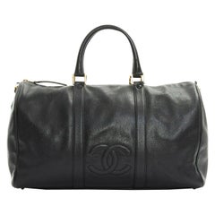 CHANEL black leather CC logo gold-tone hardware dual handle weekender duffel bag