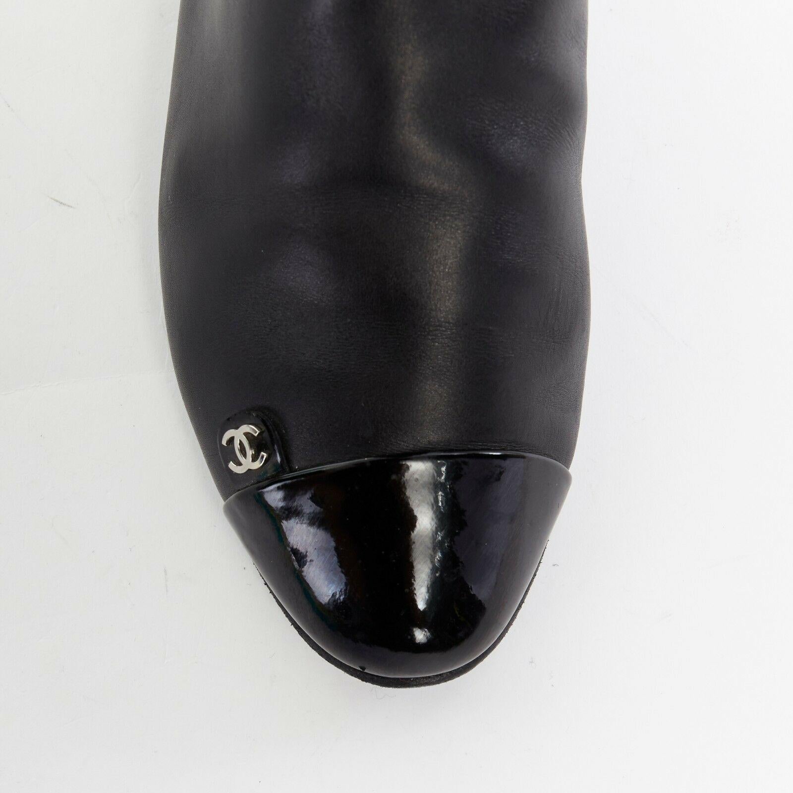 Women's CHANEL black leather CC logo patent toe cap zip back flat high boot EU36 US6 UK3