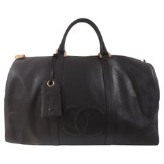 Used Chanel black leather CC logo travel bag