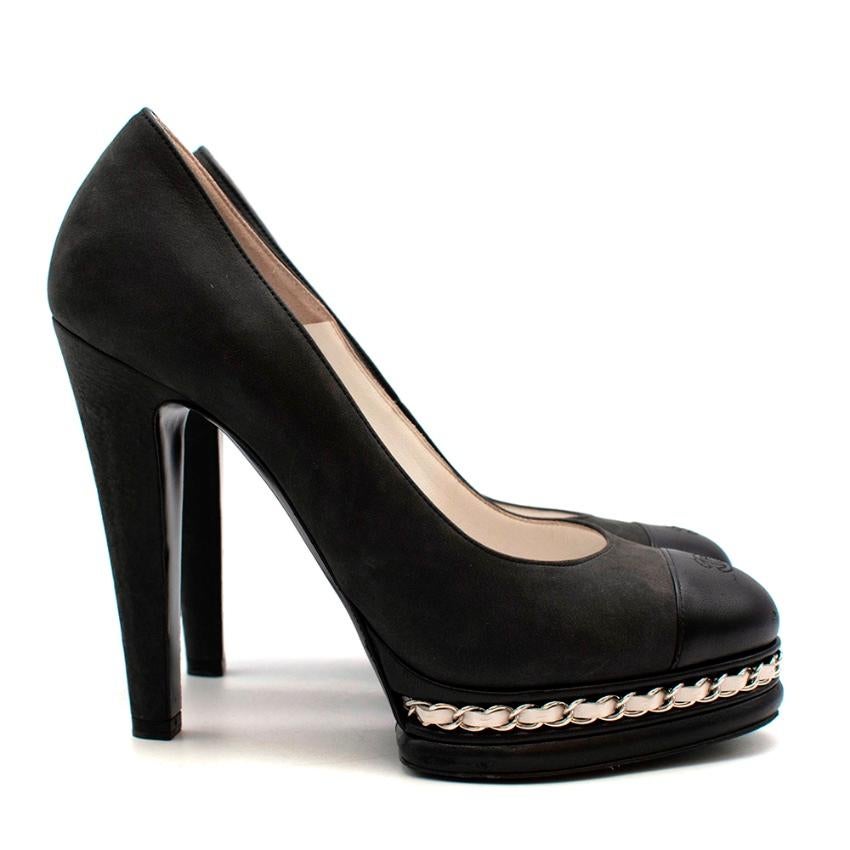 Chanel Black Leather CC Pumps with Chain Detail 

-Luxurious soft matte leather 
-Signature black leather to the toes 
-Iconic CC logo to the toes 
-White leather and chain detail to the platform 
-Amazing soft leather lining for comfort 
-Classic