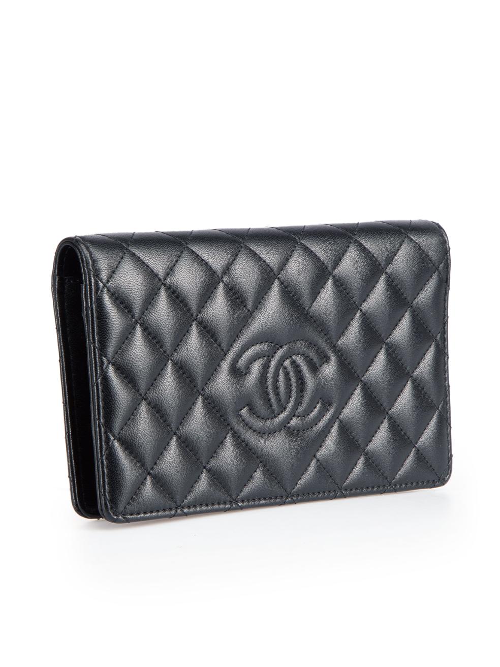 CONDITION is Very good. Minimal wear to the wallet is evident. Minimal wear to the inside is seen with a few small marks on this used Chanel designer resale item. This item comes with an original dust bag.
 
 
 
 Details
 
 
 Black
 
 Leather
 
