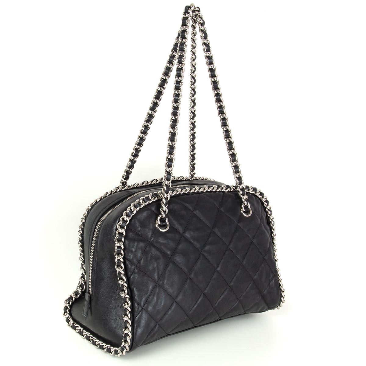 Chanel 'Chain Around Bowler' shoulder bag in black quilted calfskin featuring a silver-tone metal chain edging and shoulder straps. Opens with a zipper on top and is lined light grey nylon with one zipper pocket against the back and two open pockets
