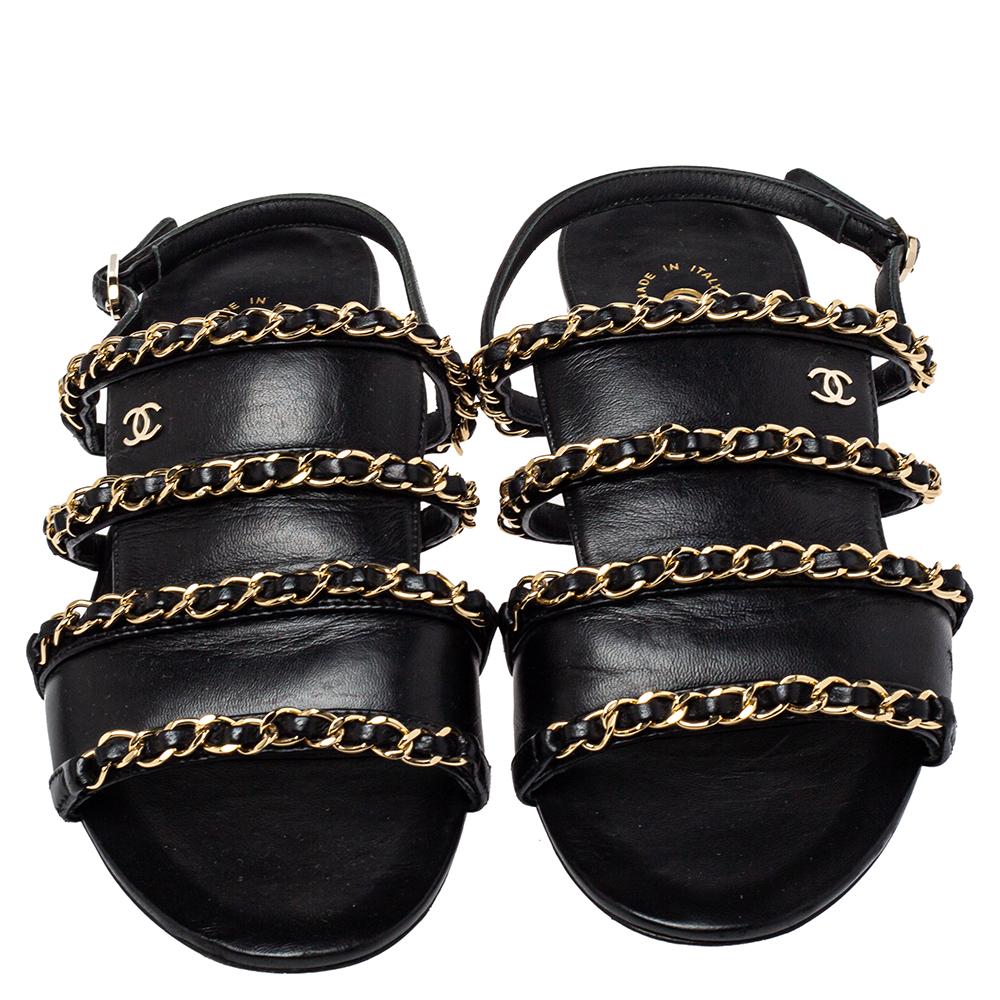 Make your feet happy with these sandals from Chanel! They have been crafted from leather and designed with gold-tone interlocking chain straps and a CC logo on the vamps. They come equipped with buckled slingback straps and comfortable leather-lined