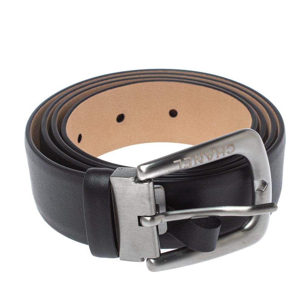 Belts are amazing accessories offering both functionality and style. This classic Chanel creation comes crafted from leather in a black shade and features an engraved silver-tone buckle closure. It is worth adding to your collection!

Includes: