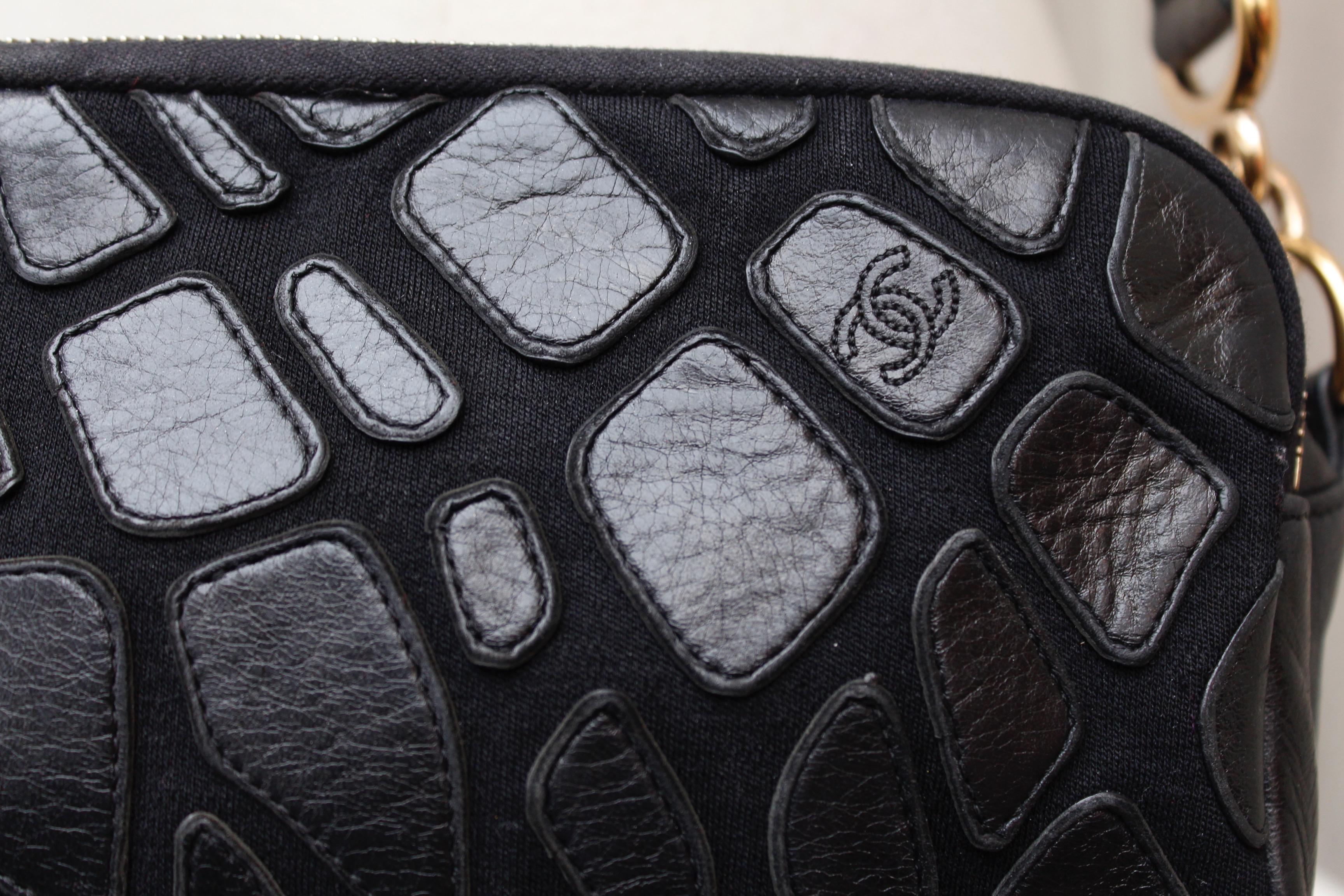 Chanel black leather cross-body bag, 2000’s 9