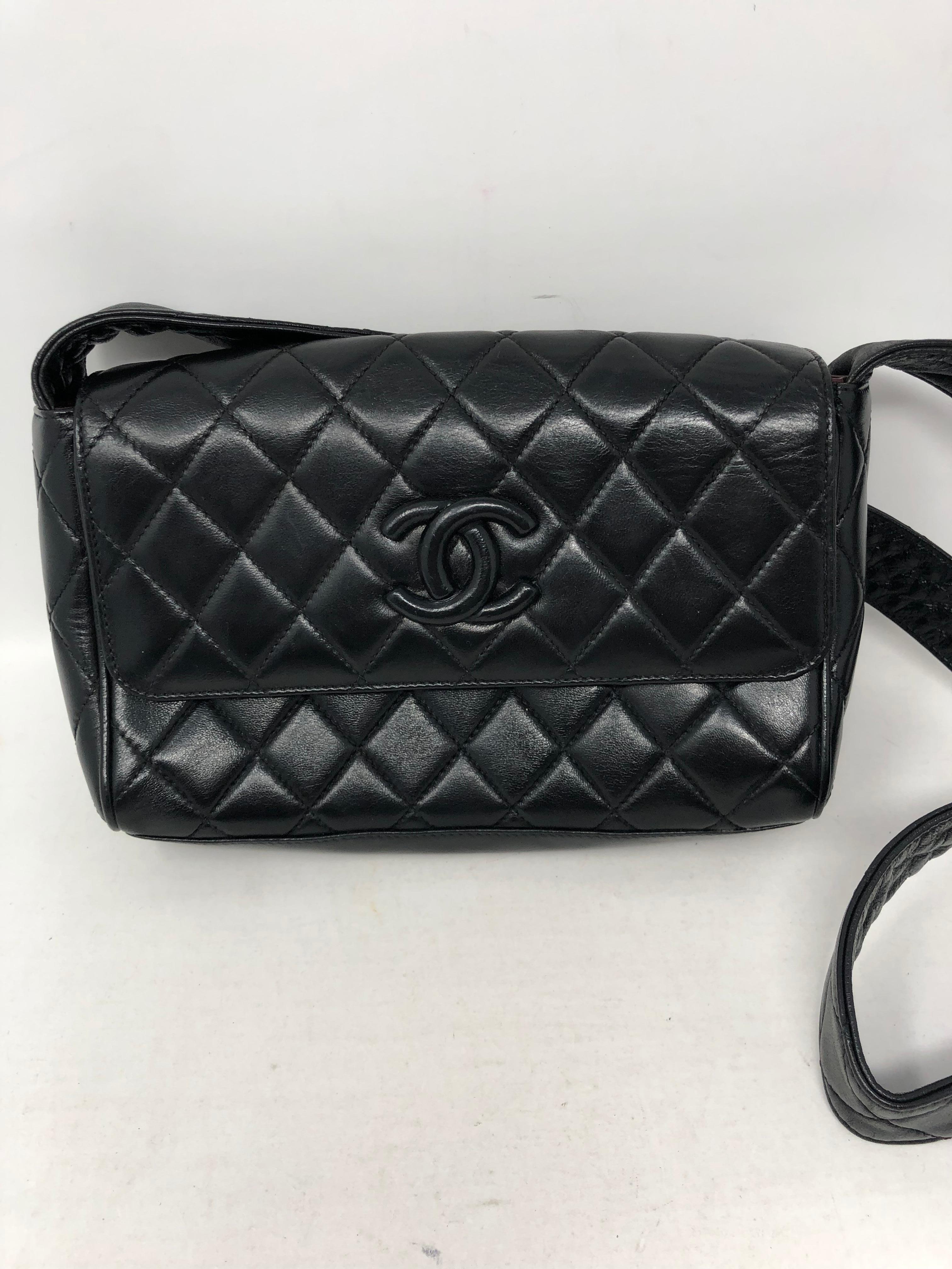 Chanel Black Leather Crossbody Bag. Matelasse leather with strap. Vintage style black on black. All leather interior. Collector's piece. Guaranteed authentic. 