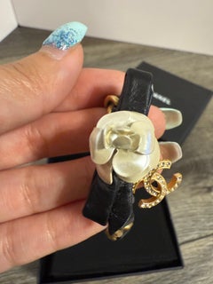 CHANEL Black Leather & Crystal Camellia CC Bracelet