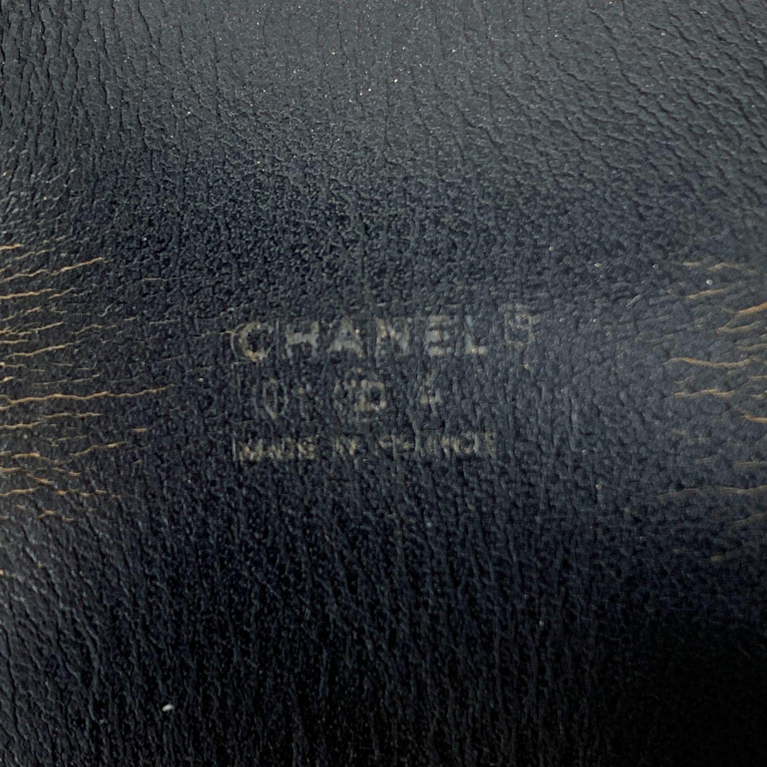 Chanel Black Leather Double Buckle Coco Adjustable Cuff Bracelet In Excellent Condition In Rome, Rome