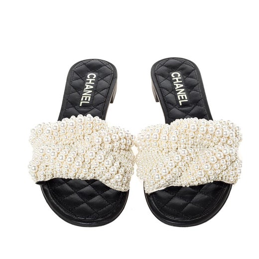 Chanel Black Leather Faux Pearl Slide Flat Sandals Size 39 at 1stDibs |  chanel black pearl slides, chanel slides with pearls, chanel pearl slides