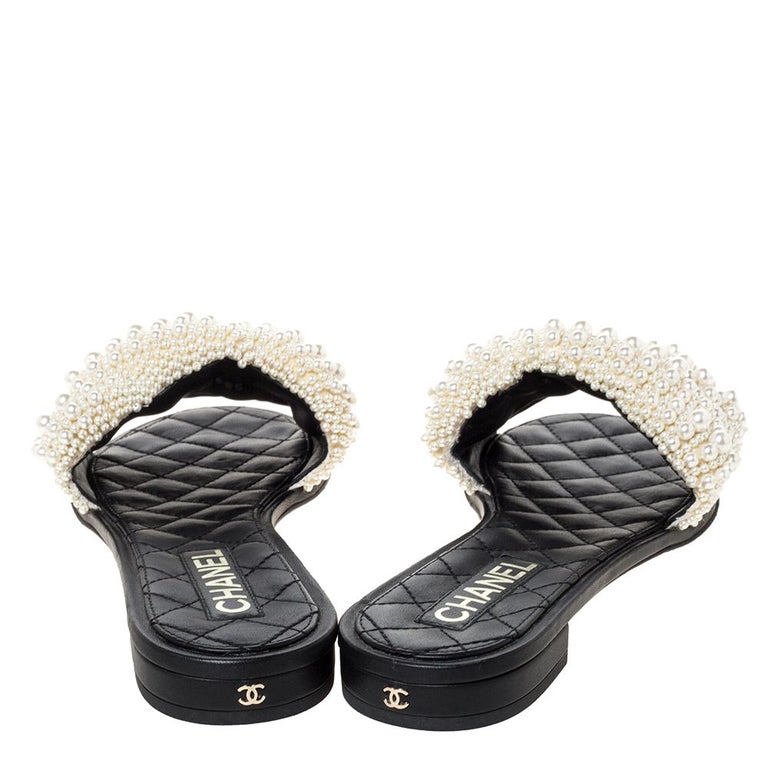 Chanel Black Leather Faux Pearl Slide Flat Sandals Size 39 at 1stDibs |  chanel pearl slides, chanel black pearl slides, chanel sandals with pearls