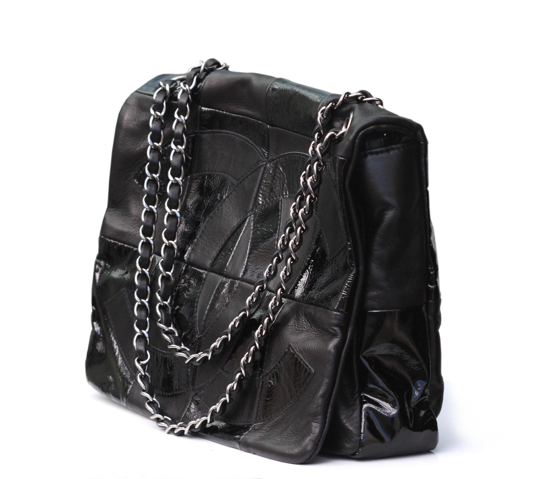 Chanel Black Leather Flap Logo Handbag

Signed. New, with sales receipt from Saks Fifth Avenue. Rectangular with palladium and leather interwoven chain strap, the flap with interlaced C's in gloss and mat leather, the reverse with alternating