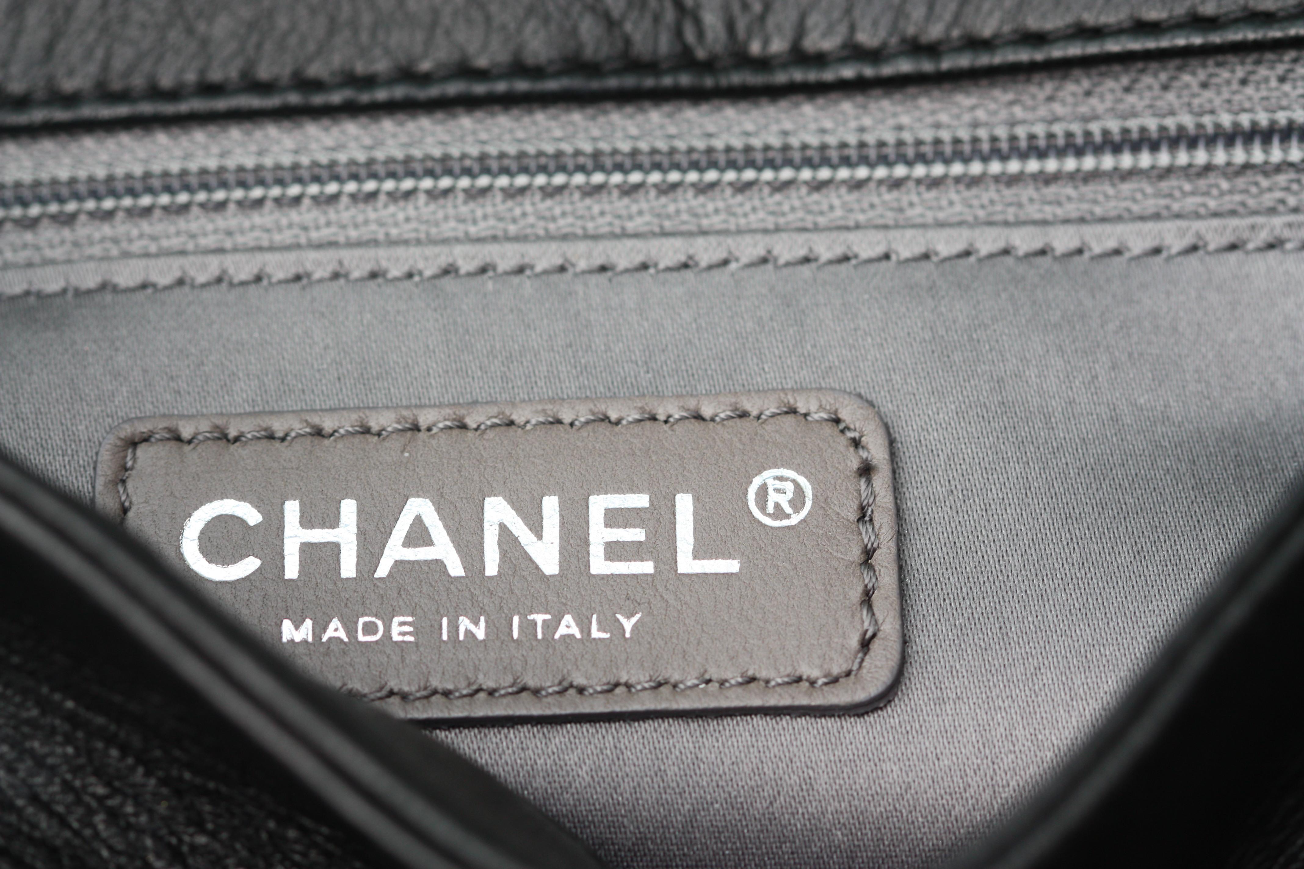 Women's or Men's Chanel Black Leather Flap Logo Handbag For Sale