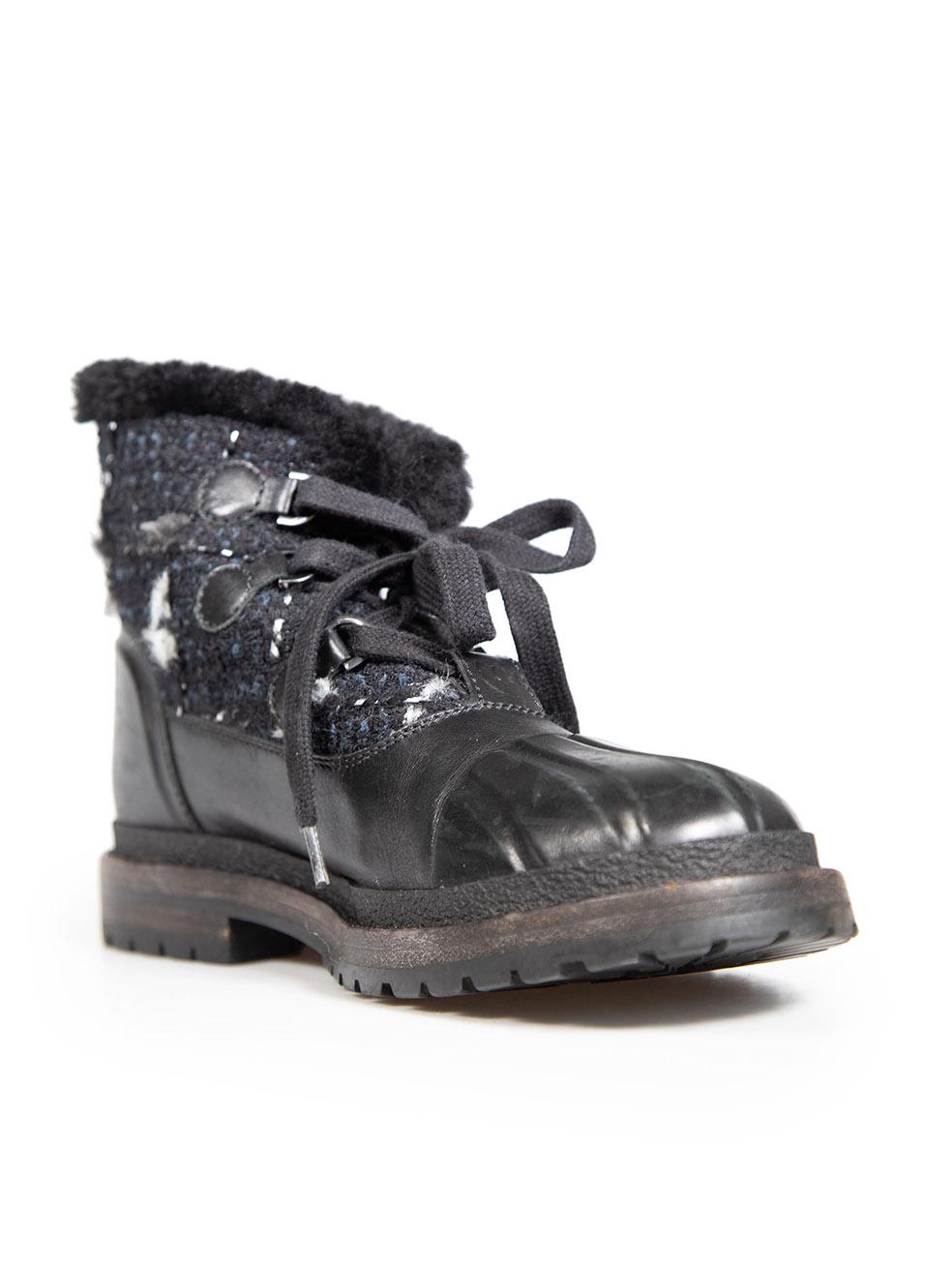 CONDITION is Very good. Minimal wear to boots is evident. Plucks to the weave on the cloth upper. Small abrasions to the back counters, tips and vamps of both shoes on this used Chanel designer resale item.
 Details
 Black
 Leather
 Combat boots
