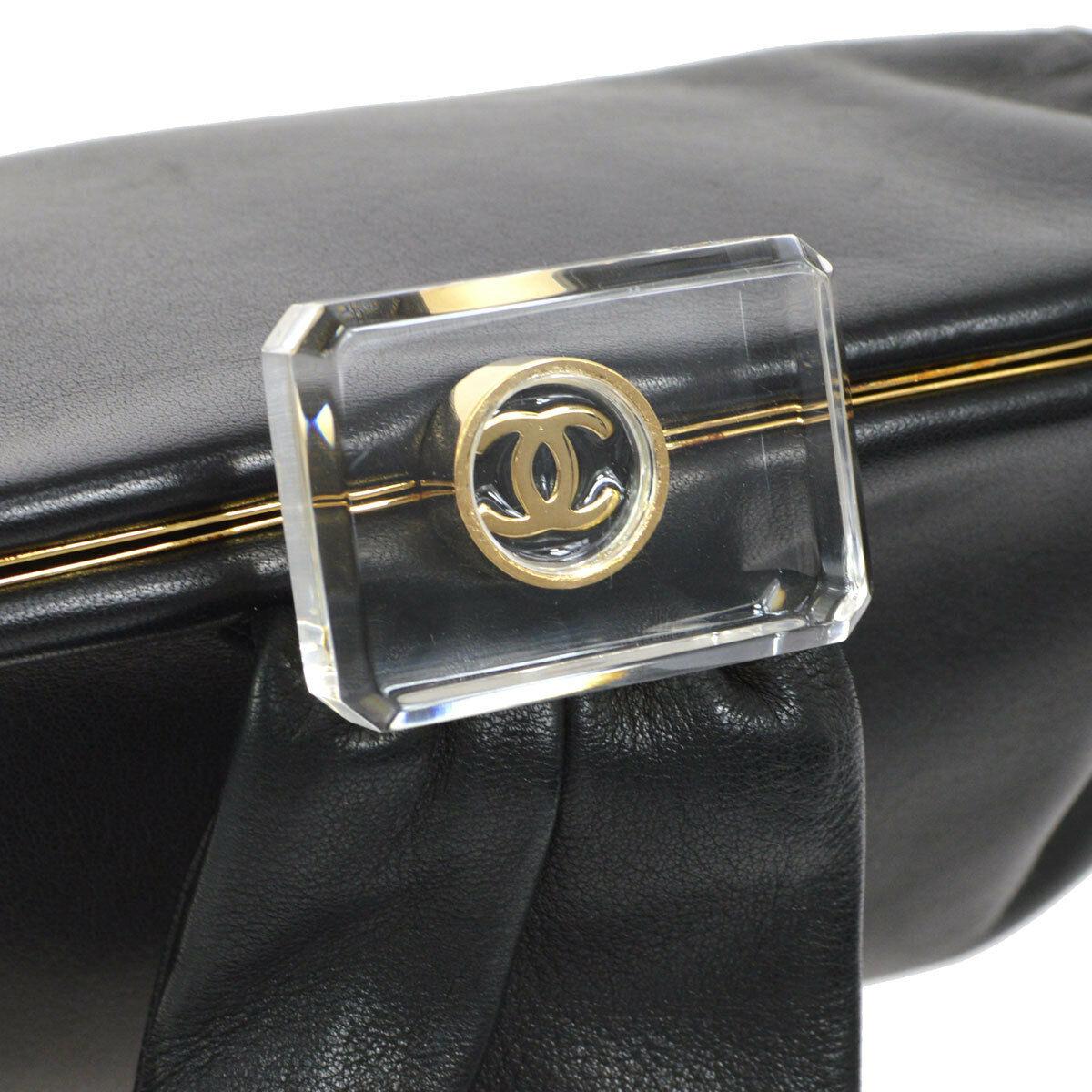 Chanel Black Leather Gold Acrylic Top Handle Satchel Wristlet Evening Clutch Bag

Leather
Gold tone hardware
Leather lining
Acrylic
Date code present
Handle drop 6