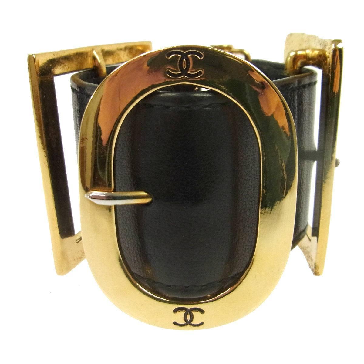 Chanel Black Leather Gold Buckle Evening Charm Cuff Bracelet in Box

Leather
Gold tone hardware
Slide bar closure 
Made in France
Width 1