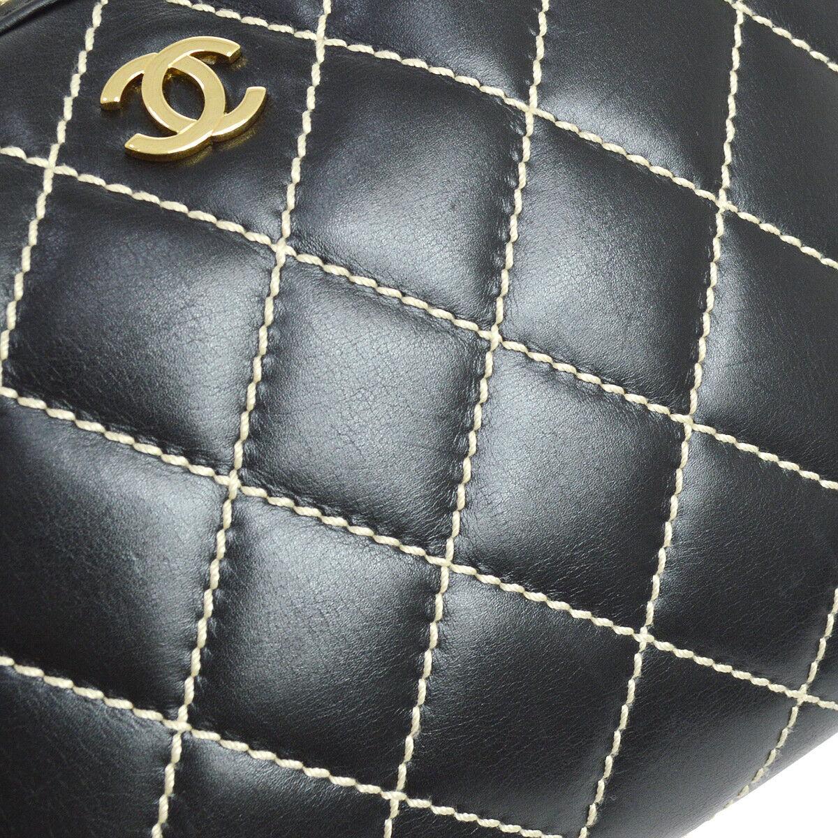 Chanel Black Leather Gold Carryall Travel Stitch Top Handle Satchel Bag

Leather
Stitch 
Gold tone hardware
Zipper closure
Woven lining
Made in Italy
Date code present
Handle drop 6.25