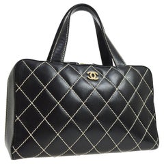 Chanel Black Leather Gold Carryall Travel Stitch Top Handle Satchel Bag