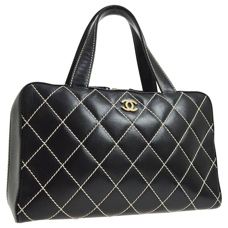 Chanel Black Leather Gold Carryall Travel Stitch Top Handle Satchel Bag For Sale