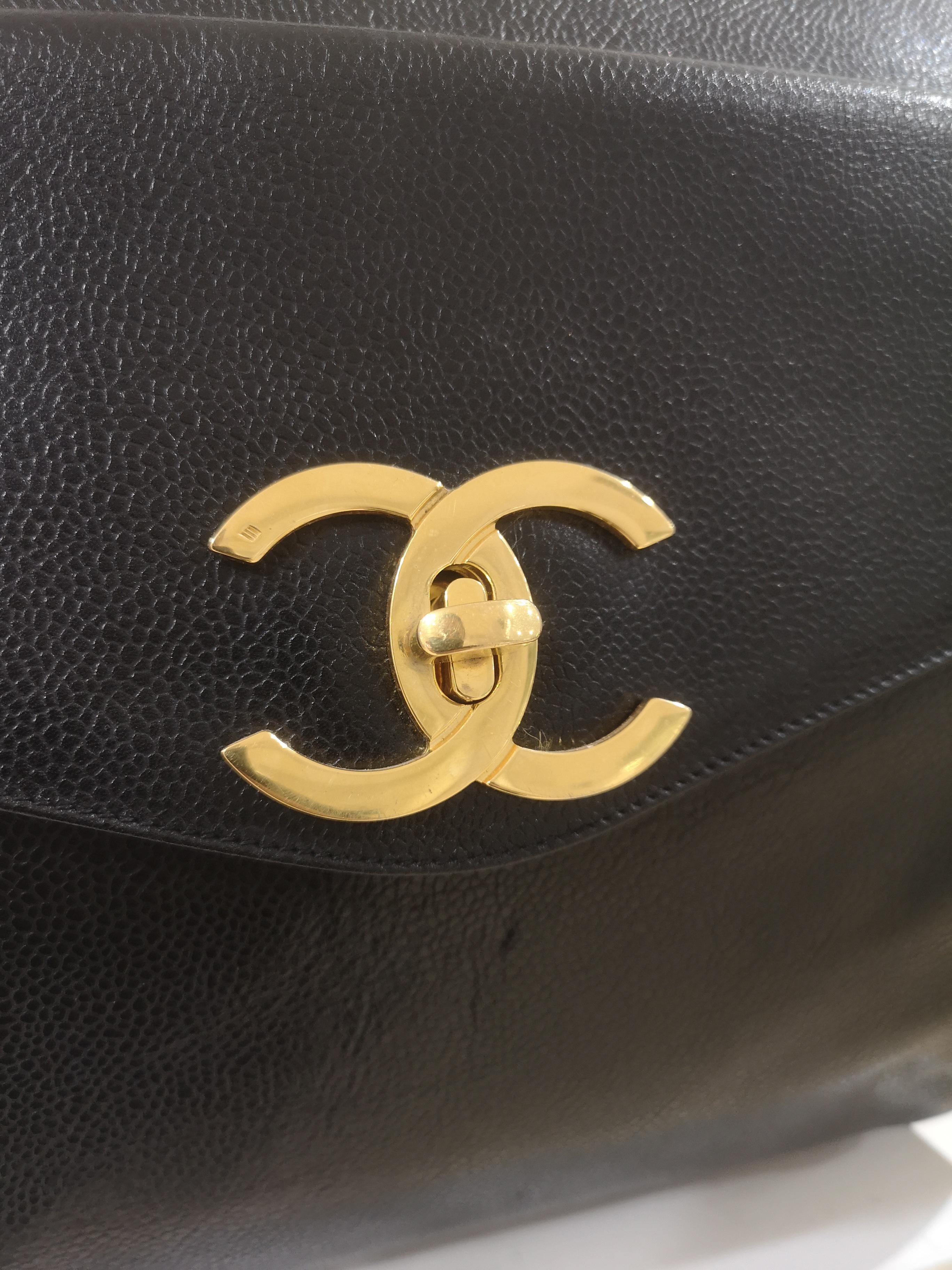 Women's or Men's Chanel black leather gold hardware CC logo shoulder bag