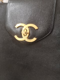 Chanel black leather gold hardware maxi shopping bag