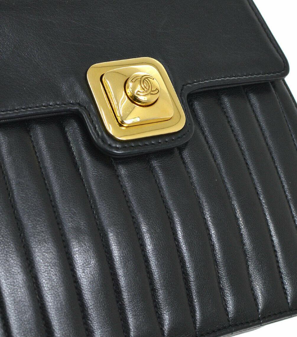 Chanel Black Leather Gold Small Mini Top Handle Satchel Kelly Style Evening Bag

Leather
Gold tone hardware
Leather lining
Push closure
Made in France
Date code present
Handle drop 4