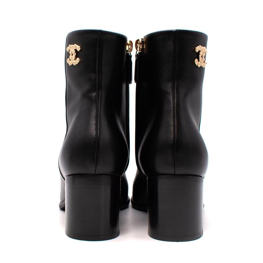 Women's Chanel Black Leather Gold-Tone CC Logo Heeled Ankle Boots, EU 37.5, US 7 For Sale