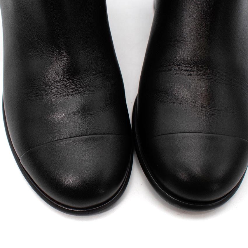 Chanel Black Leather Gold-Tone CC Logo Heeled Ankle Boots, EU 37.5, US 7 For Sale 2