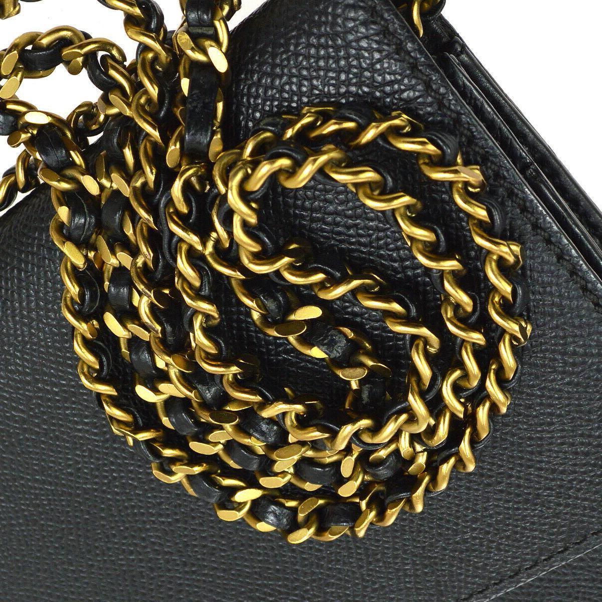 Chanel Black Leather Gold Wallet on Chain WOC Evening Shoulder Flap Bag

Caviar Leather
Gold tone hardware
Flip lock closure
Leather lining
Date code present
Shoulder strap 25
