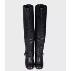Bottes Chanel en cuir noir montant jusqu'aux genoux, avec logo CC argenté, taille 38,5