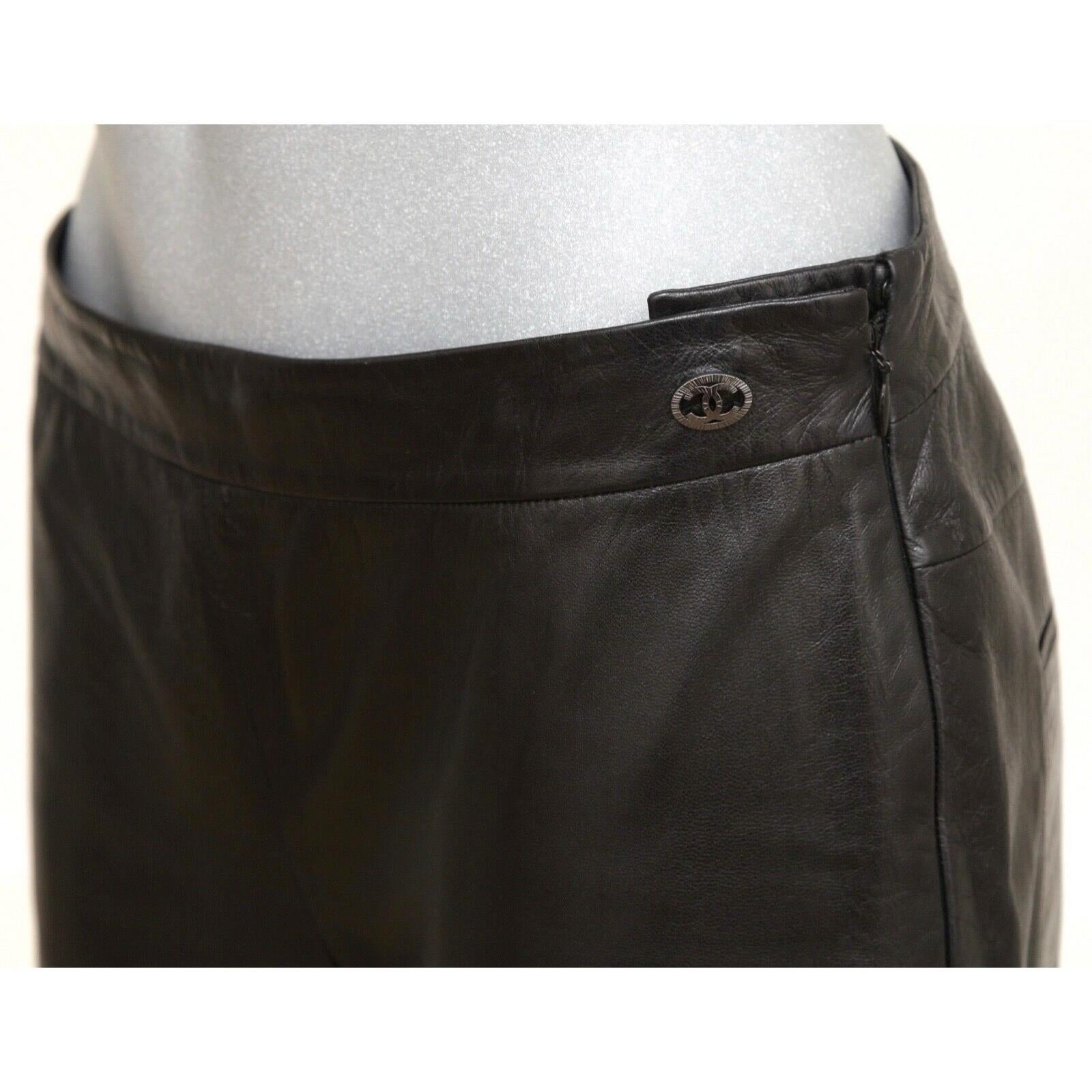GUARANTEED AUTHENTIC CHANEL LAMBSKIN BLACK LEATHER PANTS

Details:
- Soft semi-shiny black lambskin leather pant.
- Chanel plaque at left waist.
- Size zipper and interior button closure.
- Rear pockets.
- Fully lined.

Fabric: 100% Lambskin