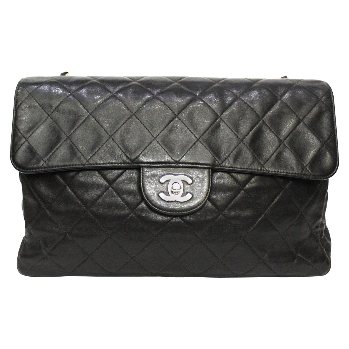 Chanel Black Leather Maxi Jumbo Bag at 1stDibs